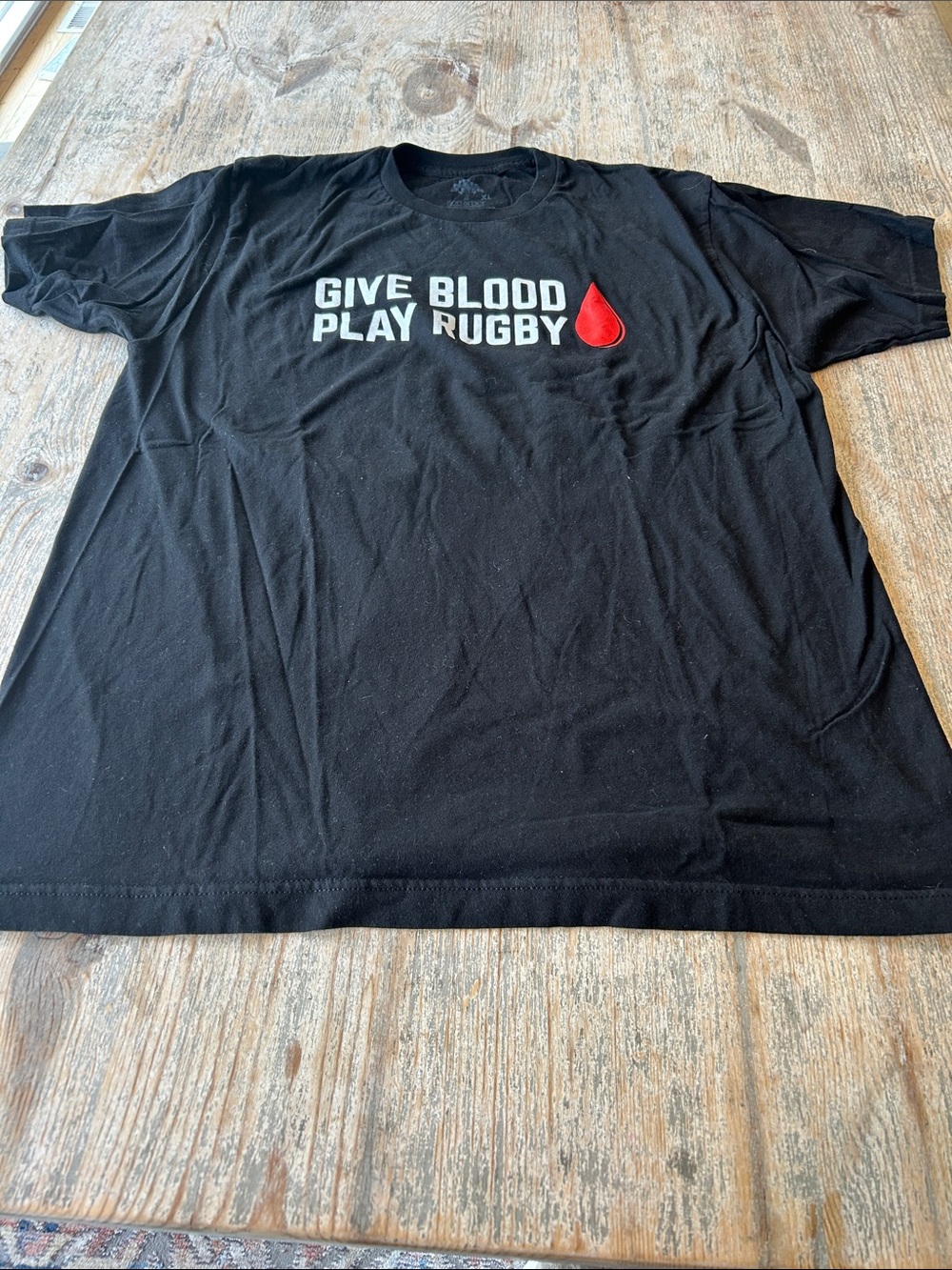 Rugby Black Tee with White Text and Red Drop Logo